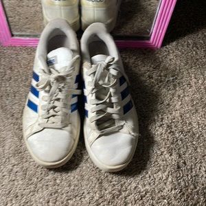 White and blue Adidas shoes